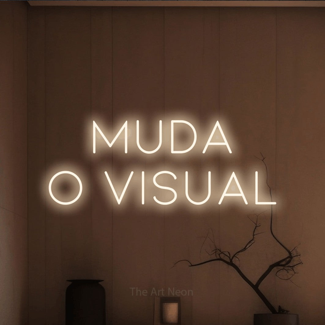 LED neon sign reading “muda o visual”, arranged in 2 lines.