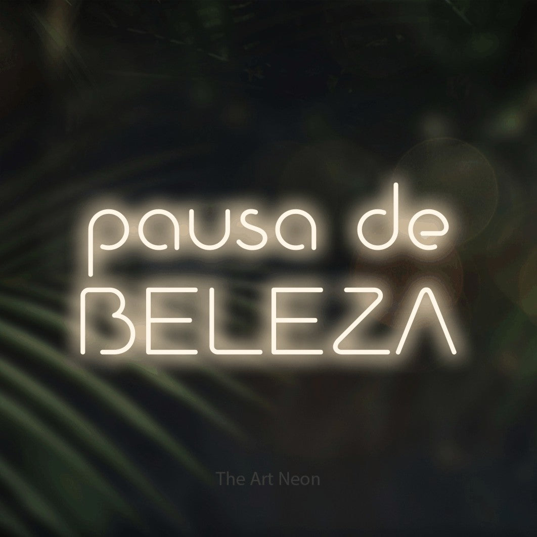LED neon sign reading “pausa de BELEZA”, arranged in 2 lines.