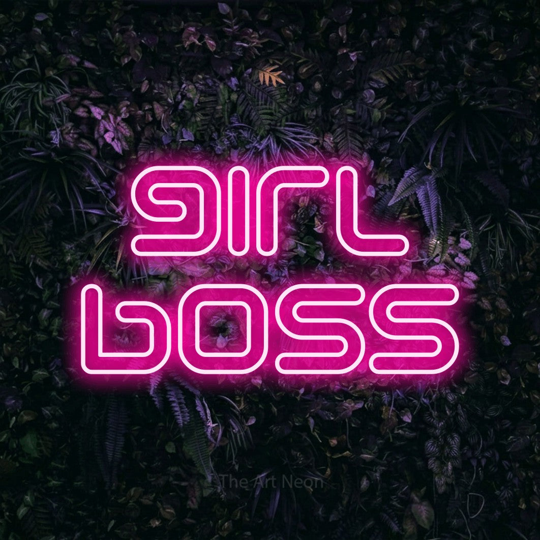 LED neon sign reading “girl boss”, arranged in 2 lines.