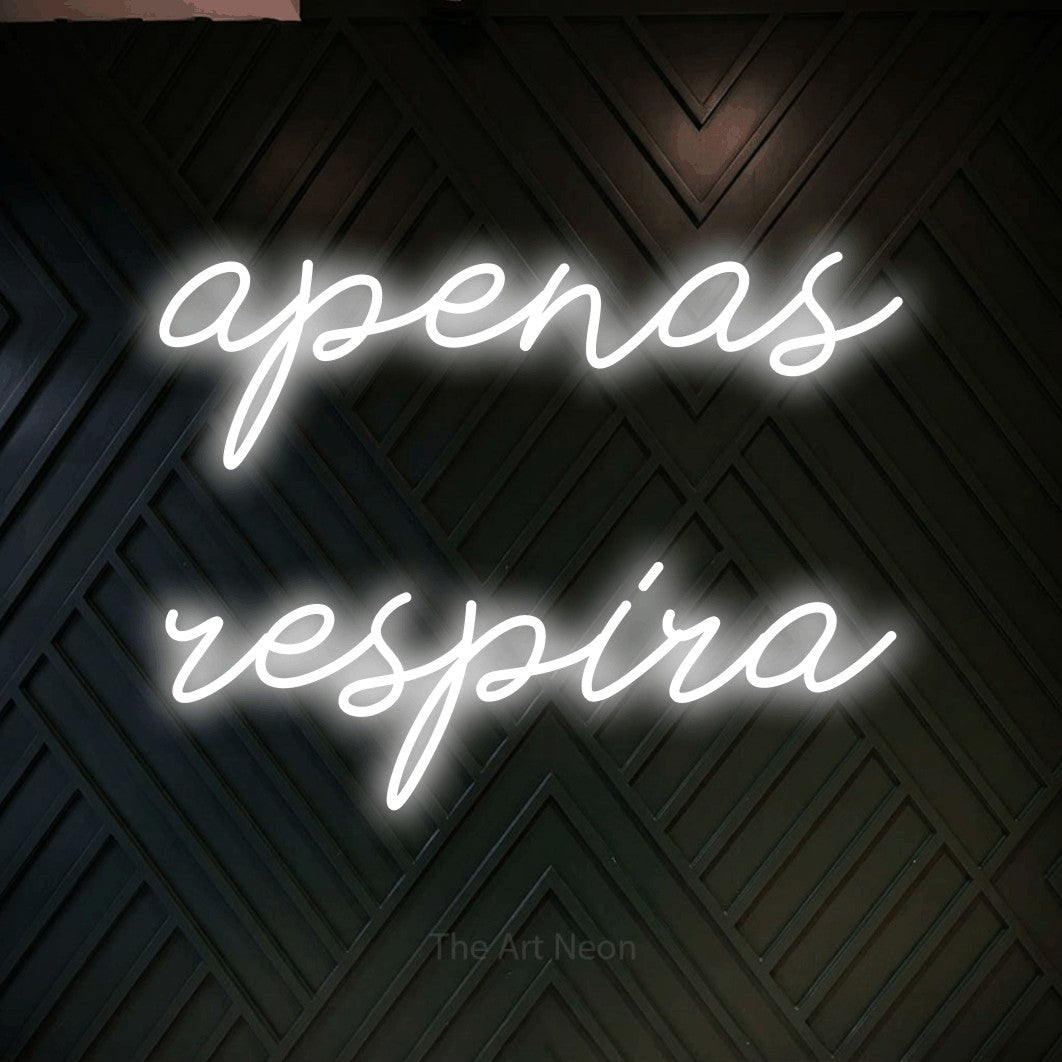 LED neon sign reading “apenas respira”, arranged in 2 lines.