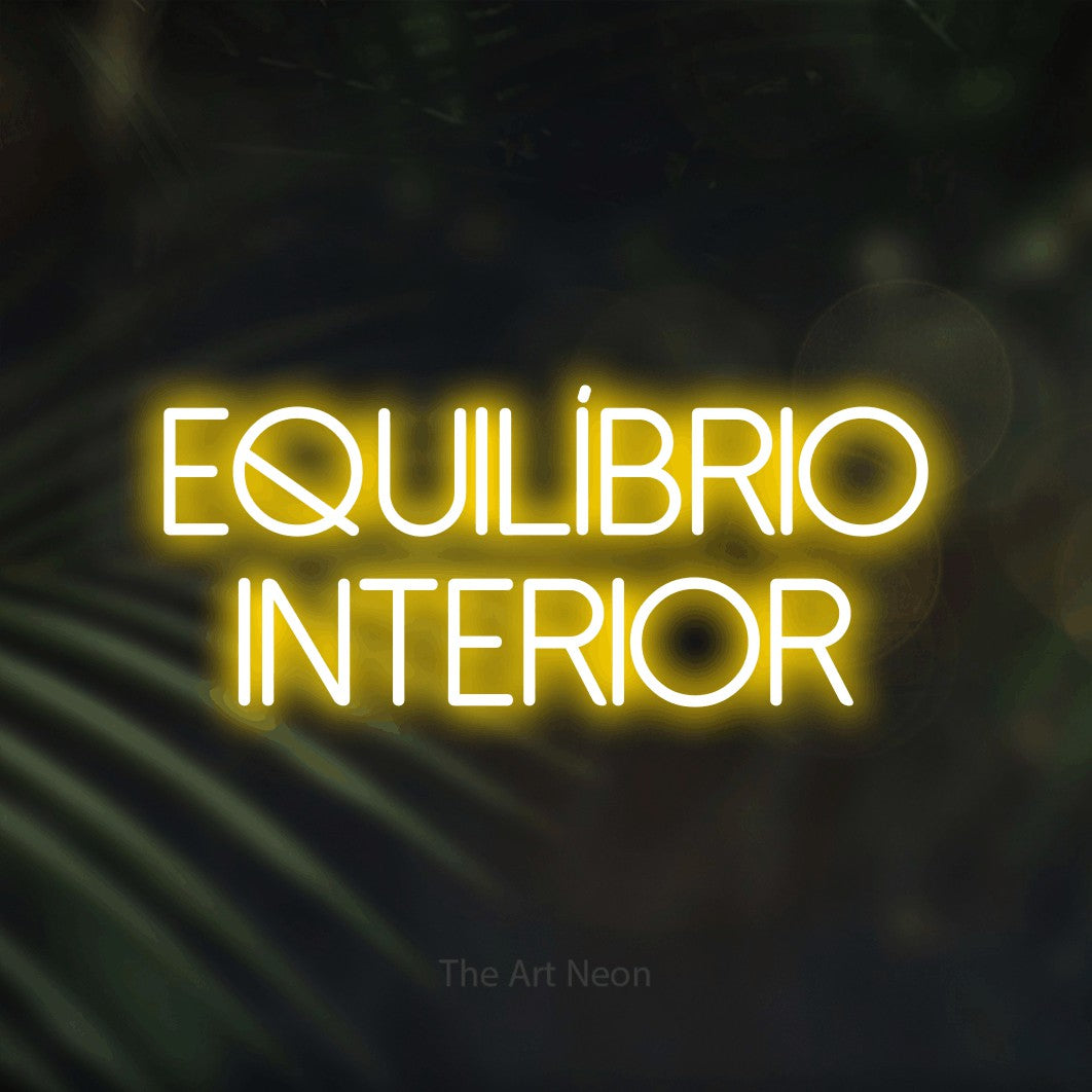 LED neon sign reading “EQUILÍBRIO INTERIOR”, arranged in 2 lines.