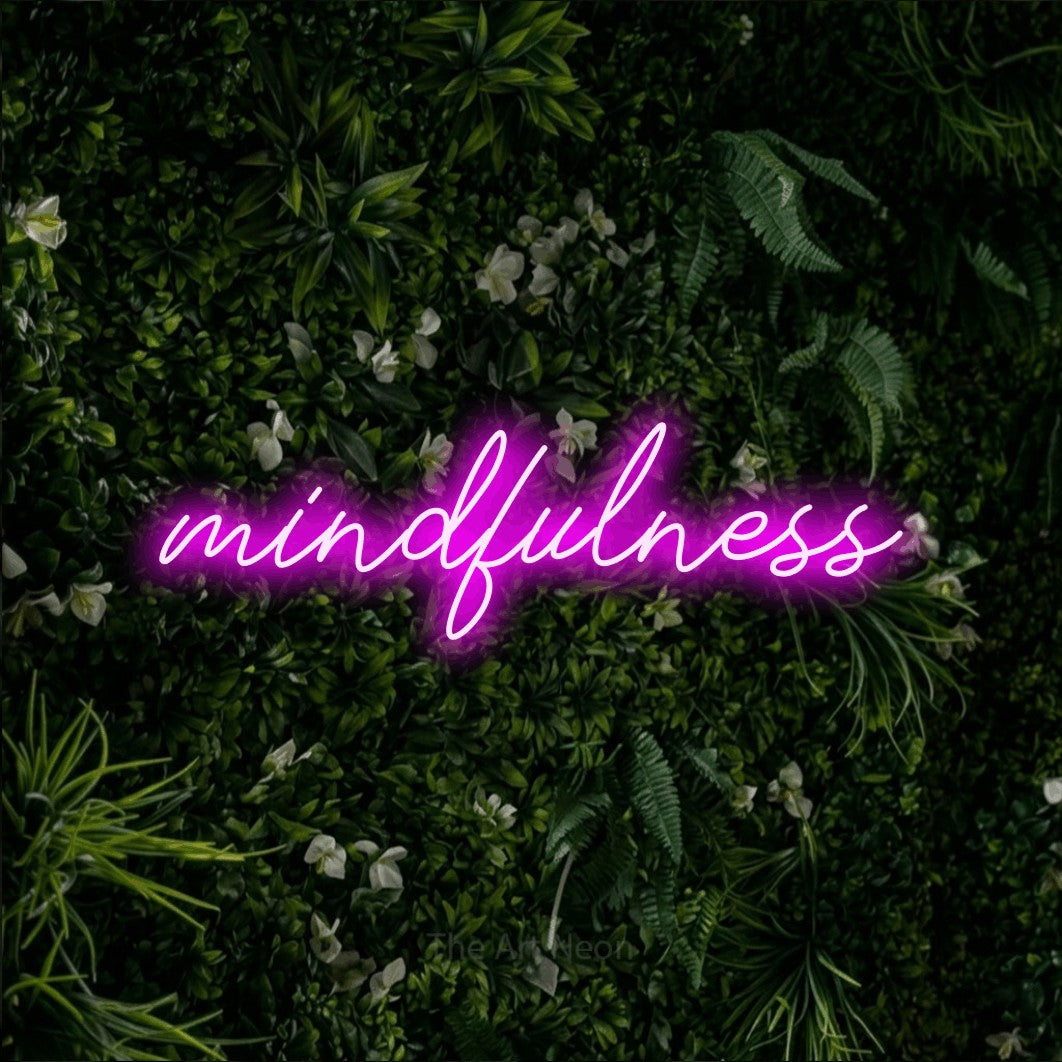 LED neon sign reading “mindfulness”, arranged in a single line.