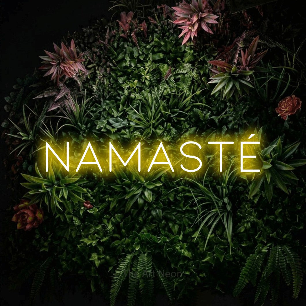 LED neon sign reading “Namasté”, arranged in a single line.
