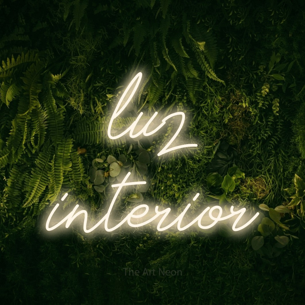 LED neon sign reading “luz interior”, arranged in 2 lines.