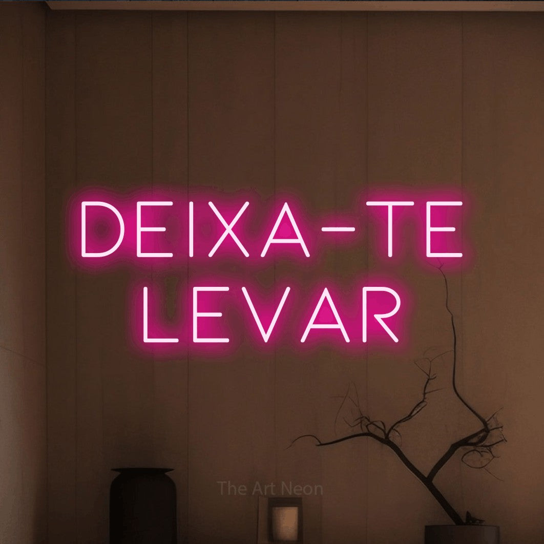 LED neon sign reading “Deixa-te Levar”, arranged in 2 lines.