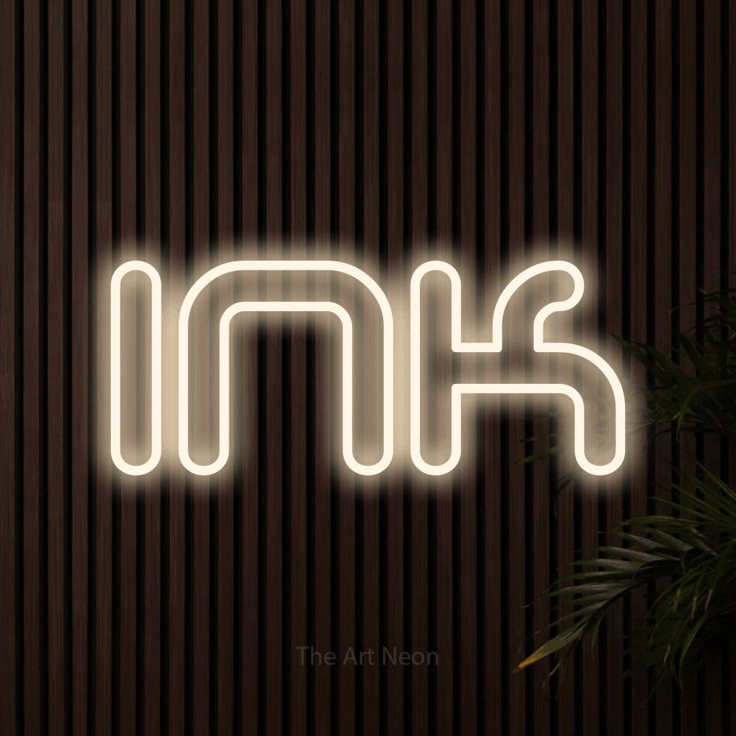 LED neon sign reading “Ink”, arranged in a single line.