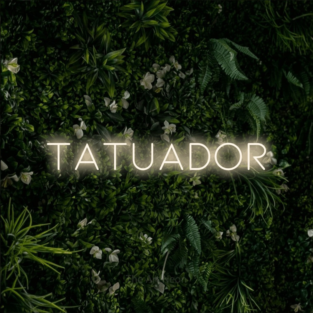 LED neon sign reading “TATUADOR”, arranged in a single line.