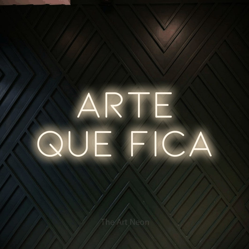 LED neon sign reading “ARTE QUE FICA”, arranged in 2 lines.