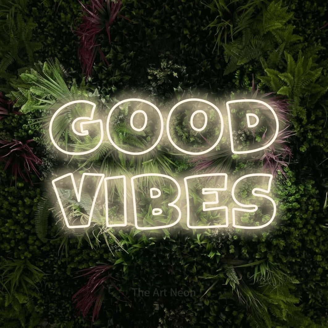 LED neon sign reading “Good Vibes”, arranged in 2 lines.