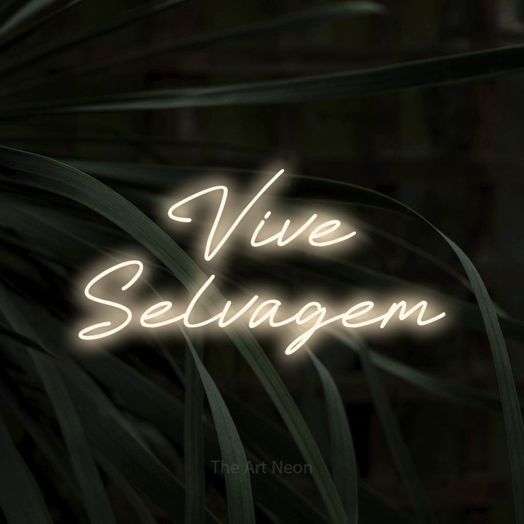 LED neon sign reading “Vive Selvagem”, arranged in 2 lines.