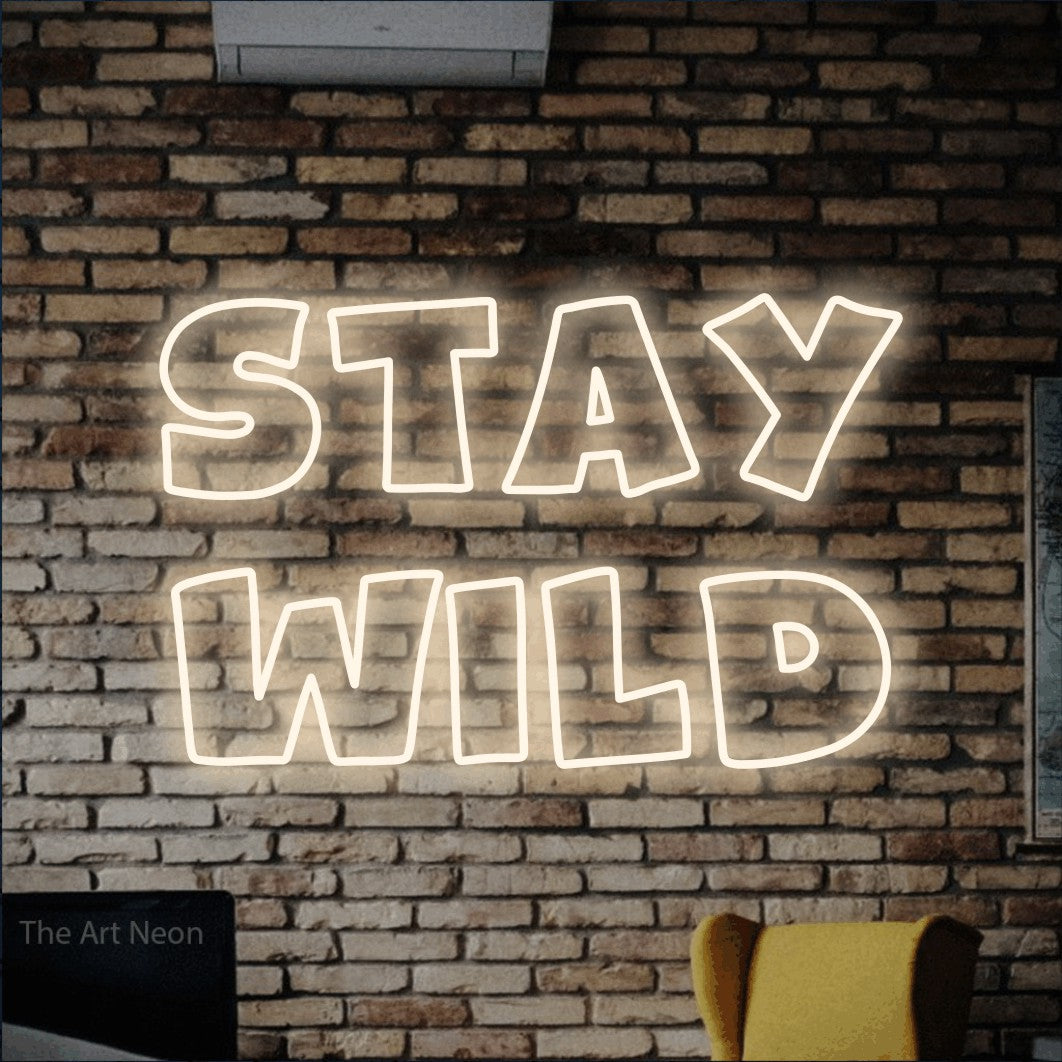 LED neon sign reading “Stay Wild”, arranged in 2 lines.