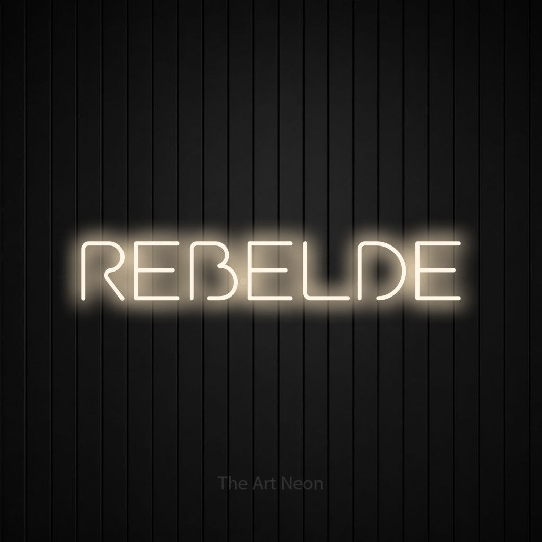 LED neon sign reading “REBELDE”, arranged in a single line.