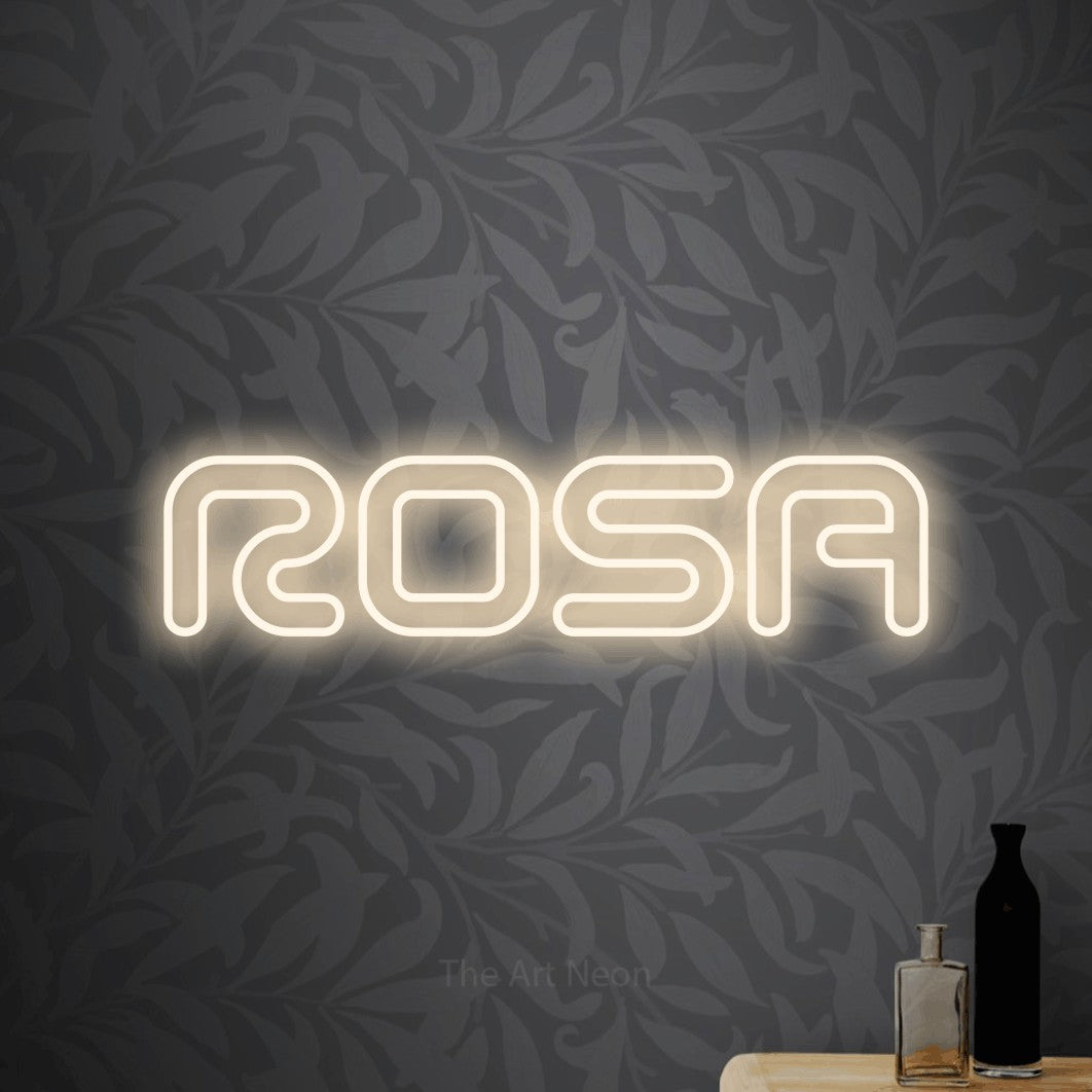 LED neon sign reading “ROSA”, arranged in a single line.