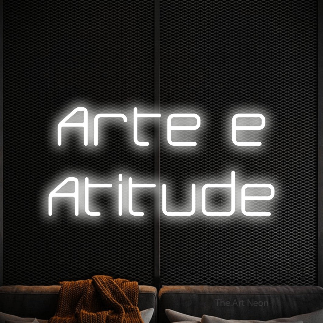 LED neon sign reading “Arte e Atitude”, arranged in 2 lines.