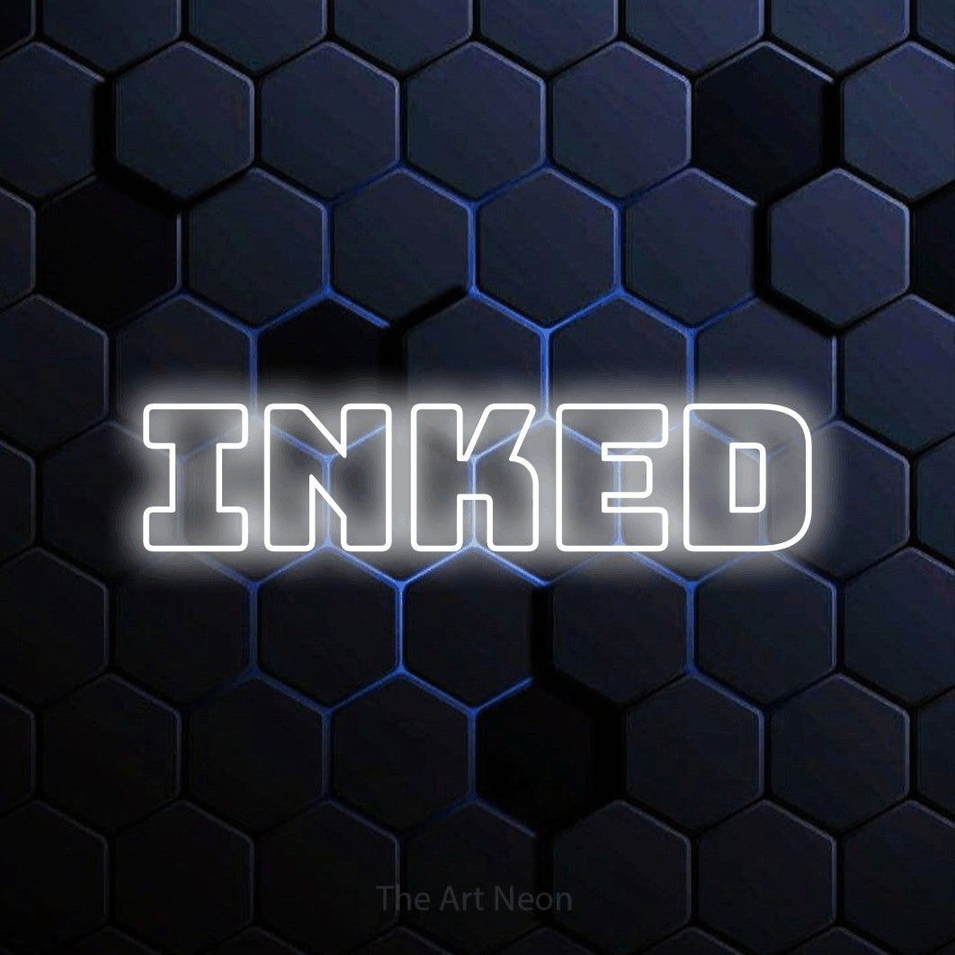 LED neon sign reading “Inked”, arranged in a single line.