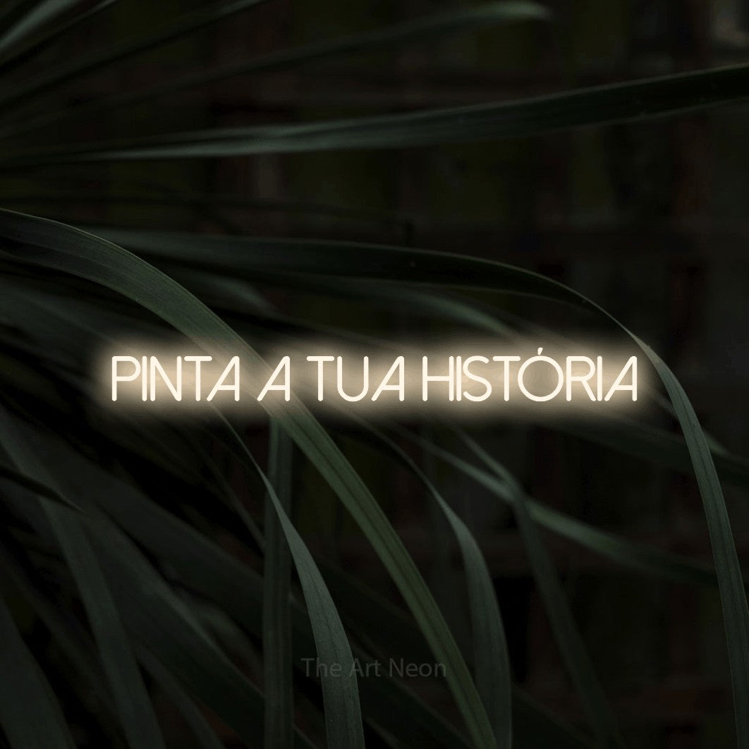 LED neon sign reading “Pinta a Tua História”, arranged in a single line.