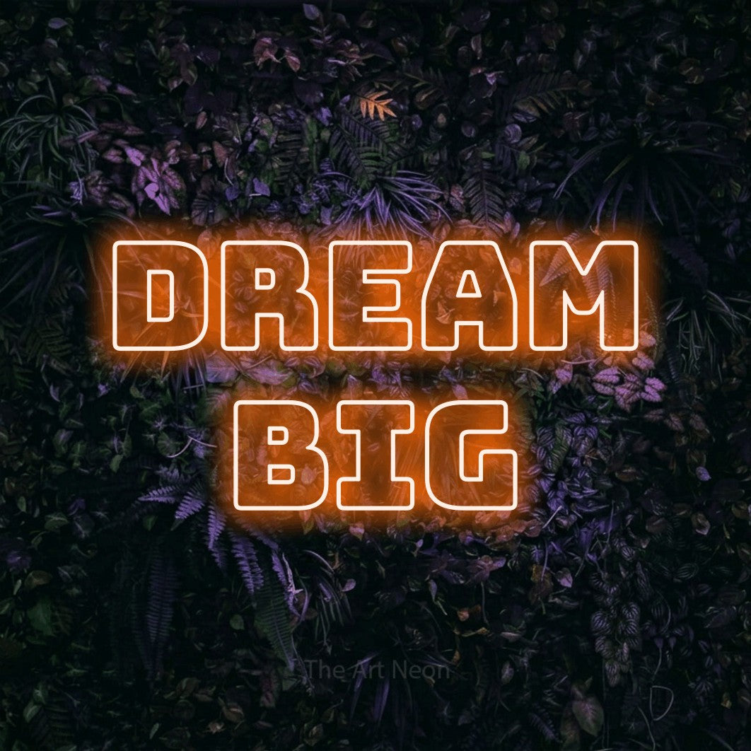 LED neon sign reading “DREAM BIG”, arranged in 2 lines.