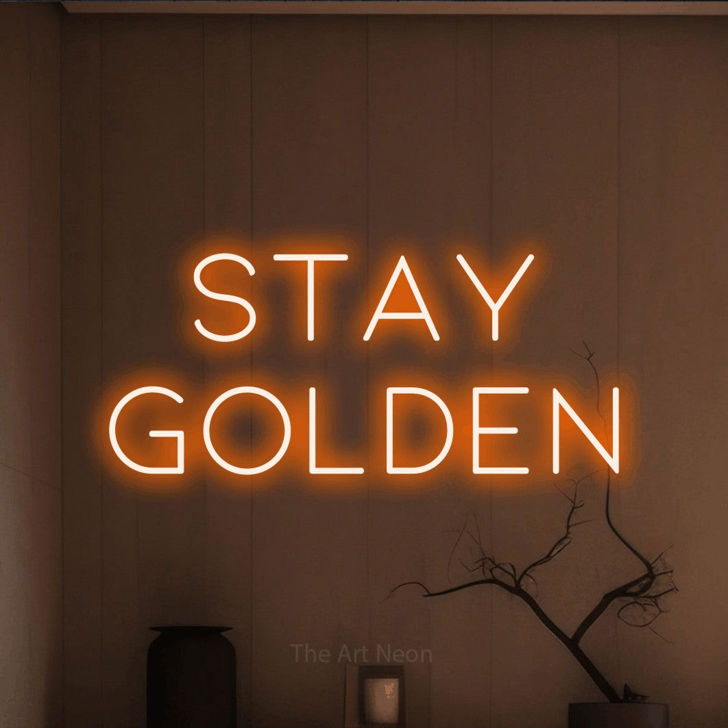 LED neon sign reading “STAY GOLDEN”, arranged in 2 lines.