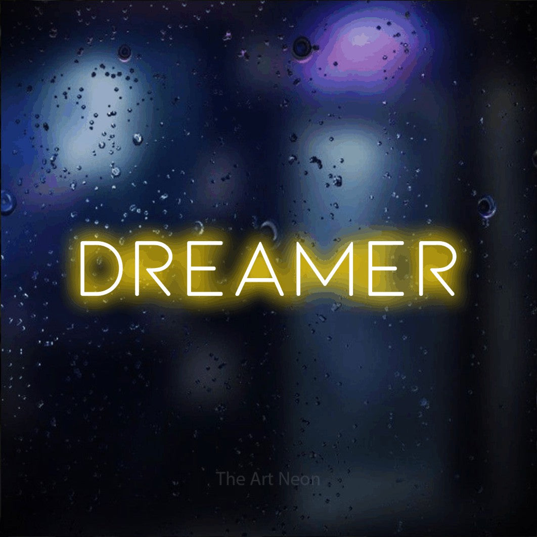 LED neon sign reading “Dreamer”, arranged in a single line.