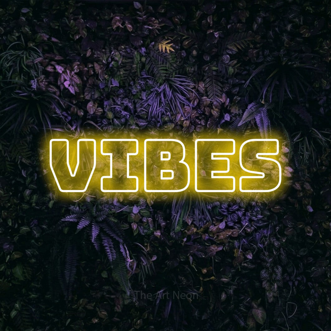 LED neon sign reading “vibes”, arranged in a single line.