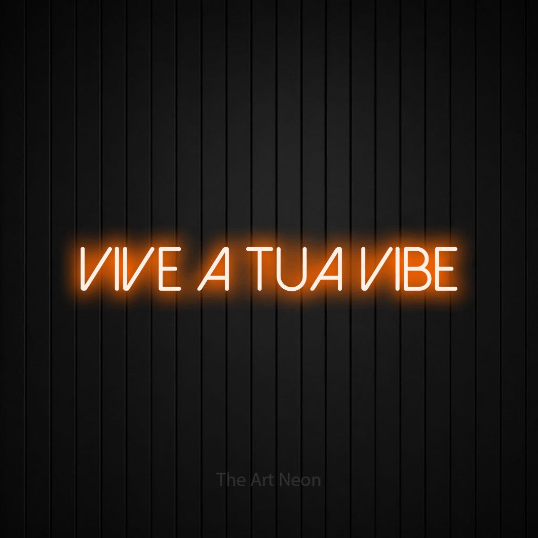 LED neon sign reading “Vive a Tua Vibe”, arranged in a single line.