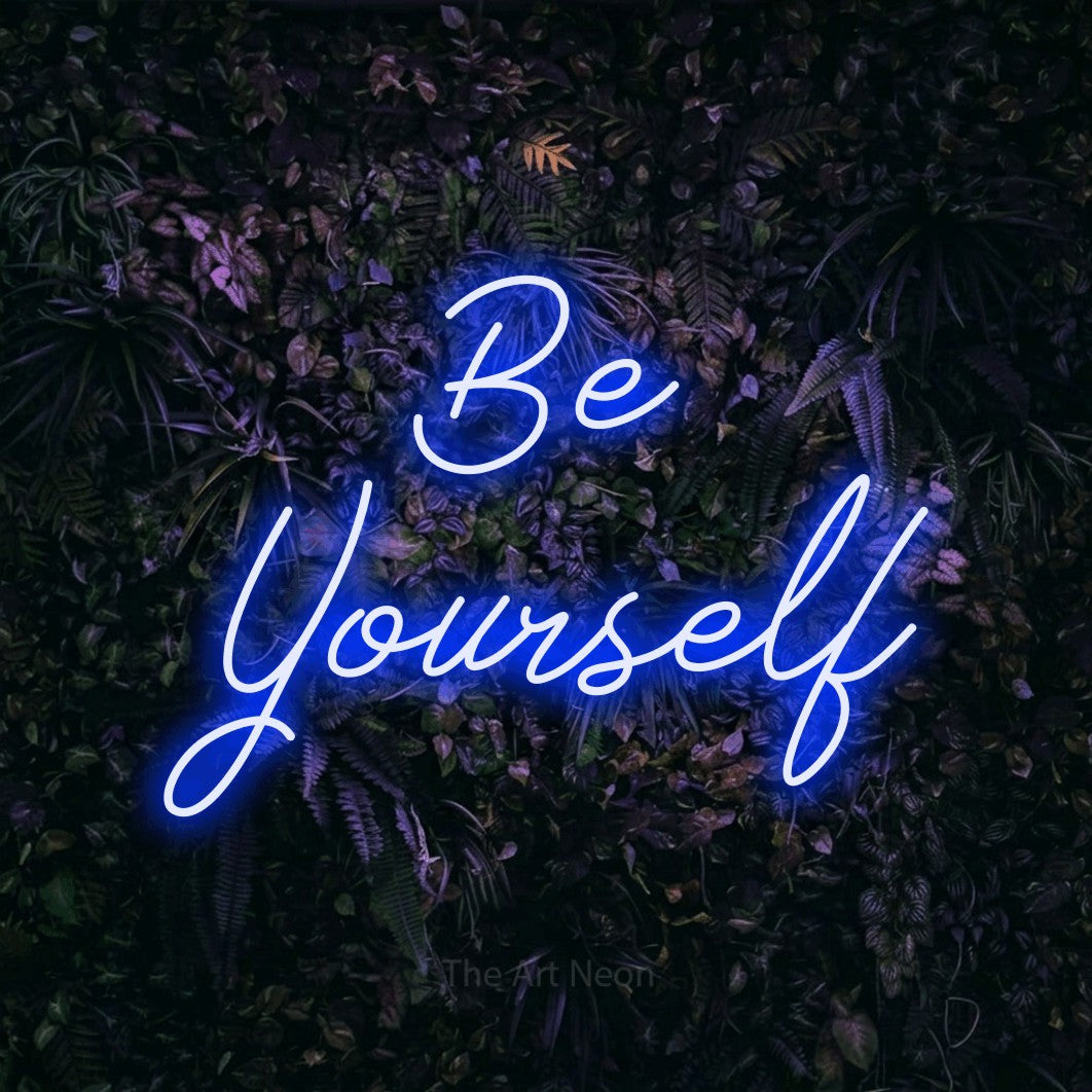 LED neon sign reading “Be Yourself”, arranged in 2 lines.