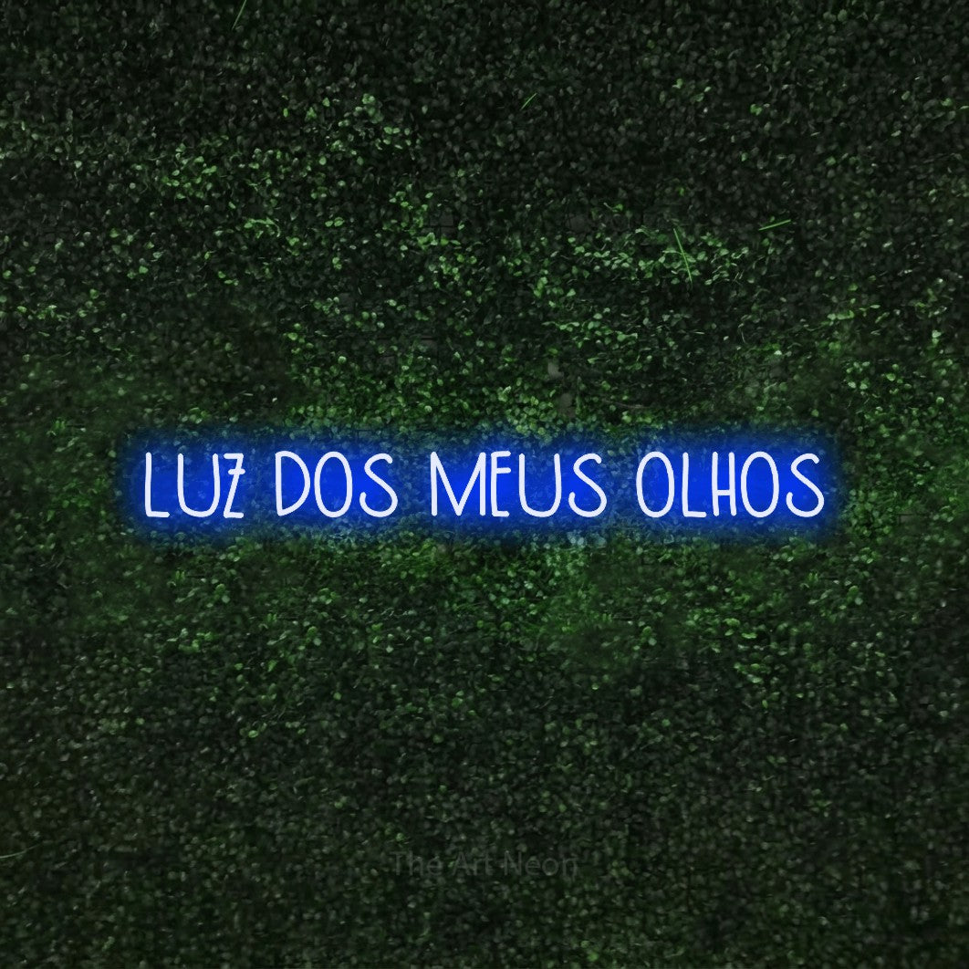 LED neon sign reading “LUZ DOS MEUS OLHOS”, arranged in a single line.