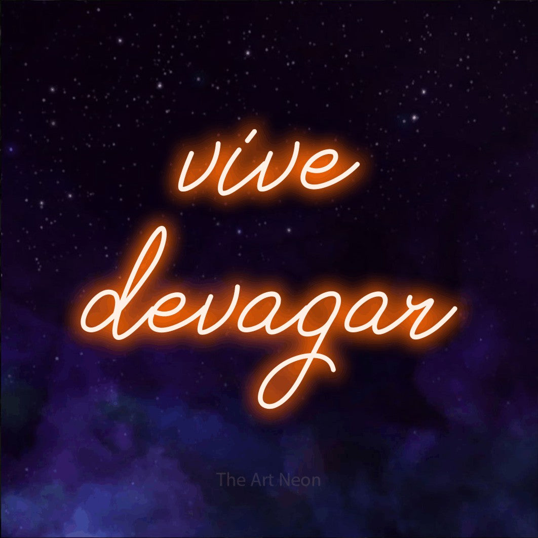 LED neon sign reading “vive devagar”, arranged in 2 lines.