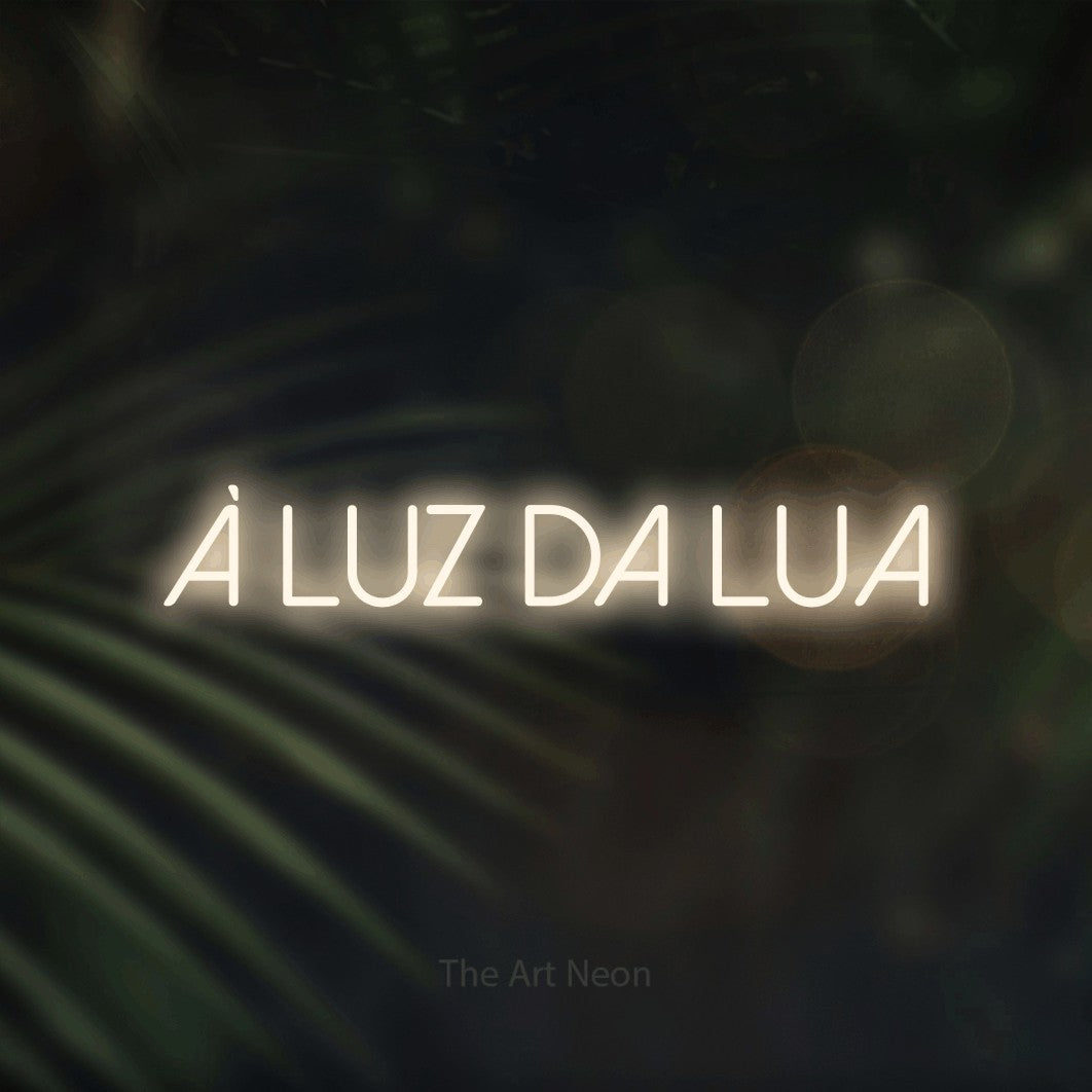 LED neon sign reading “À LUZ DA LUA”, arranged in a single line.