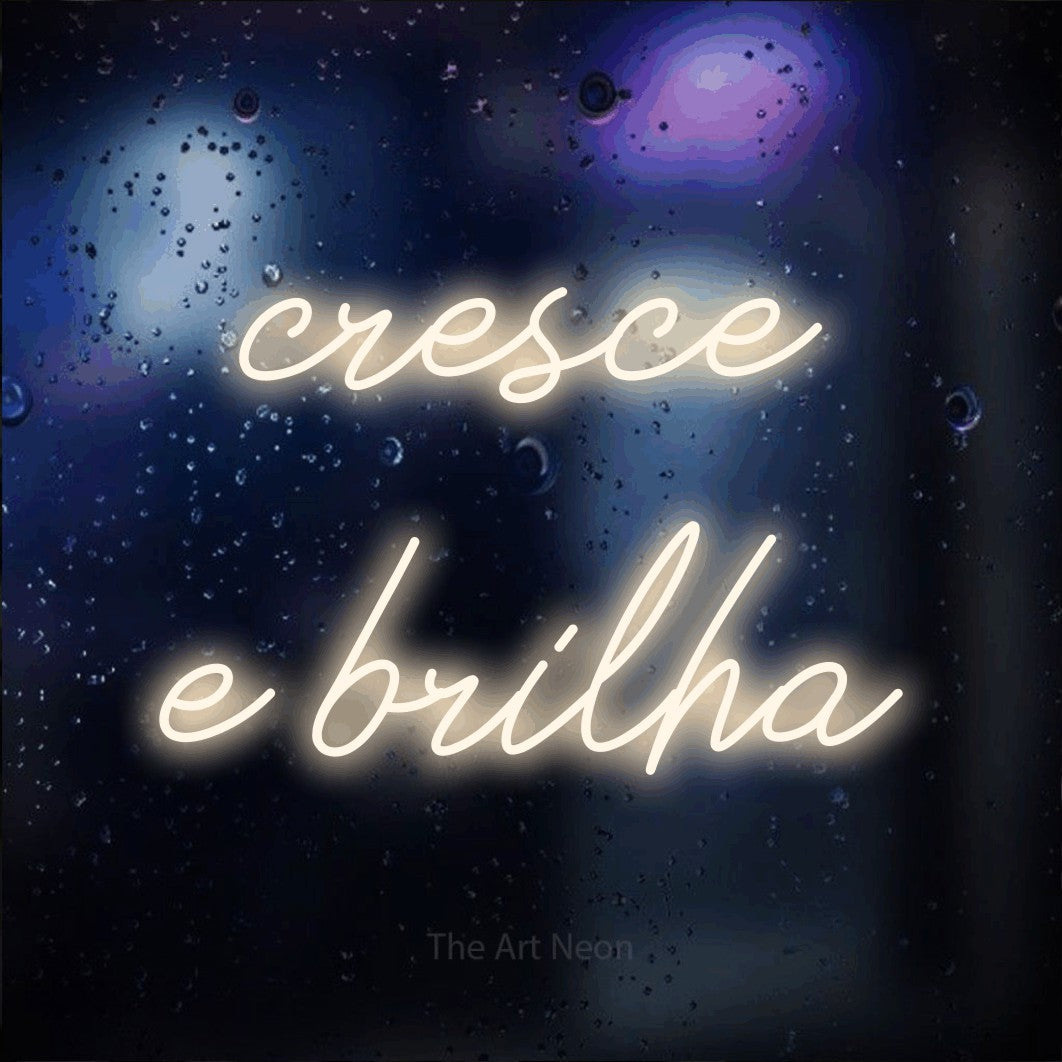 LED neon sign reading “cresce e brilha”, arranged in 2 lines.