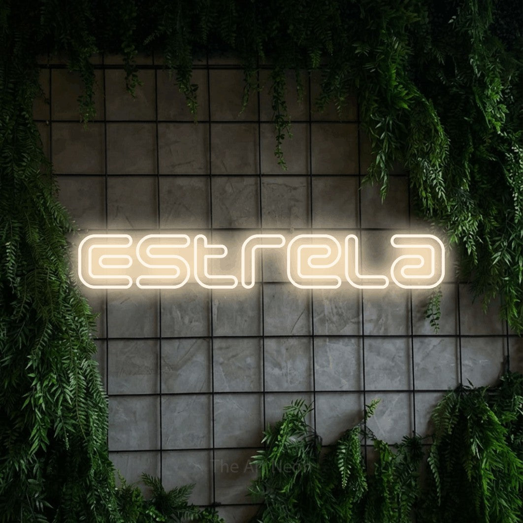 LED neon sign reading “Estrela”, arranged in a single line.