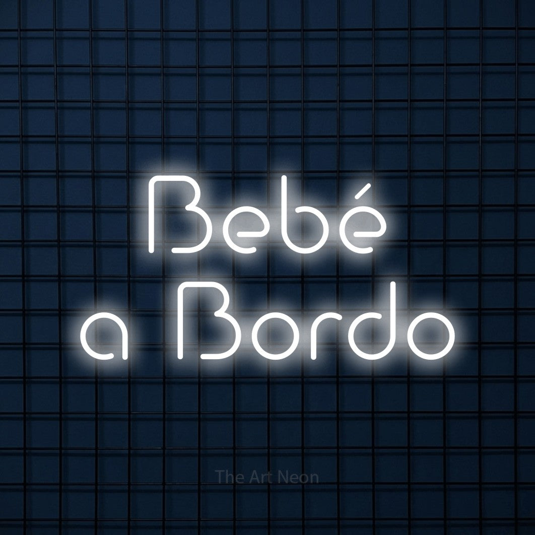 LED neon sign reading “Bebé a Bordo”, arranged in 2 lines.