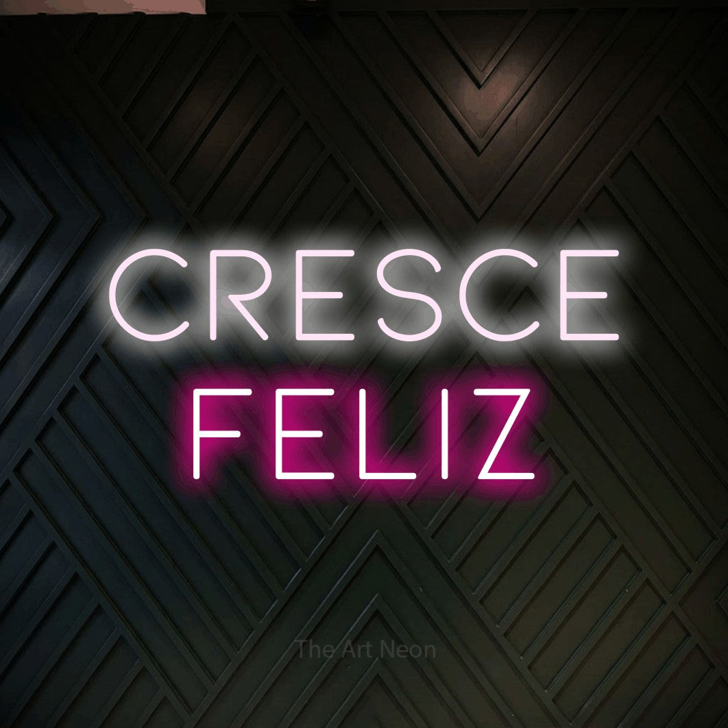 LED neon sign reading “cresce feliz”, arranged in 2 lines.