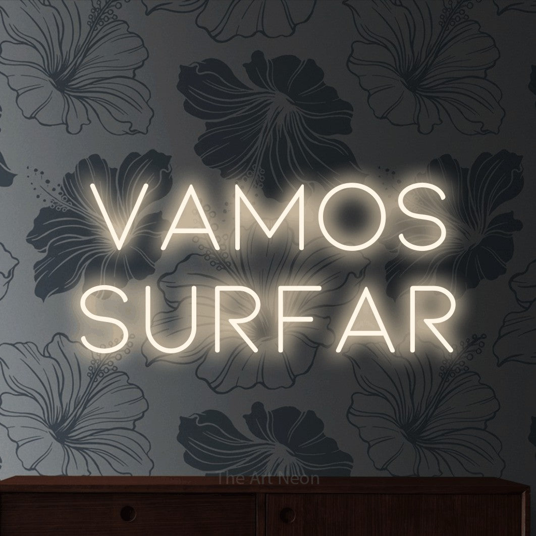 LED neon sign reading “Vamos Surfar”, arranged in 2 lines.