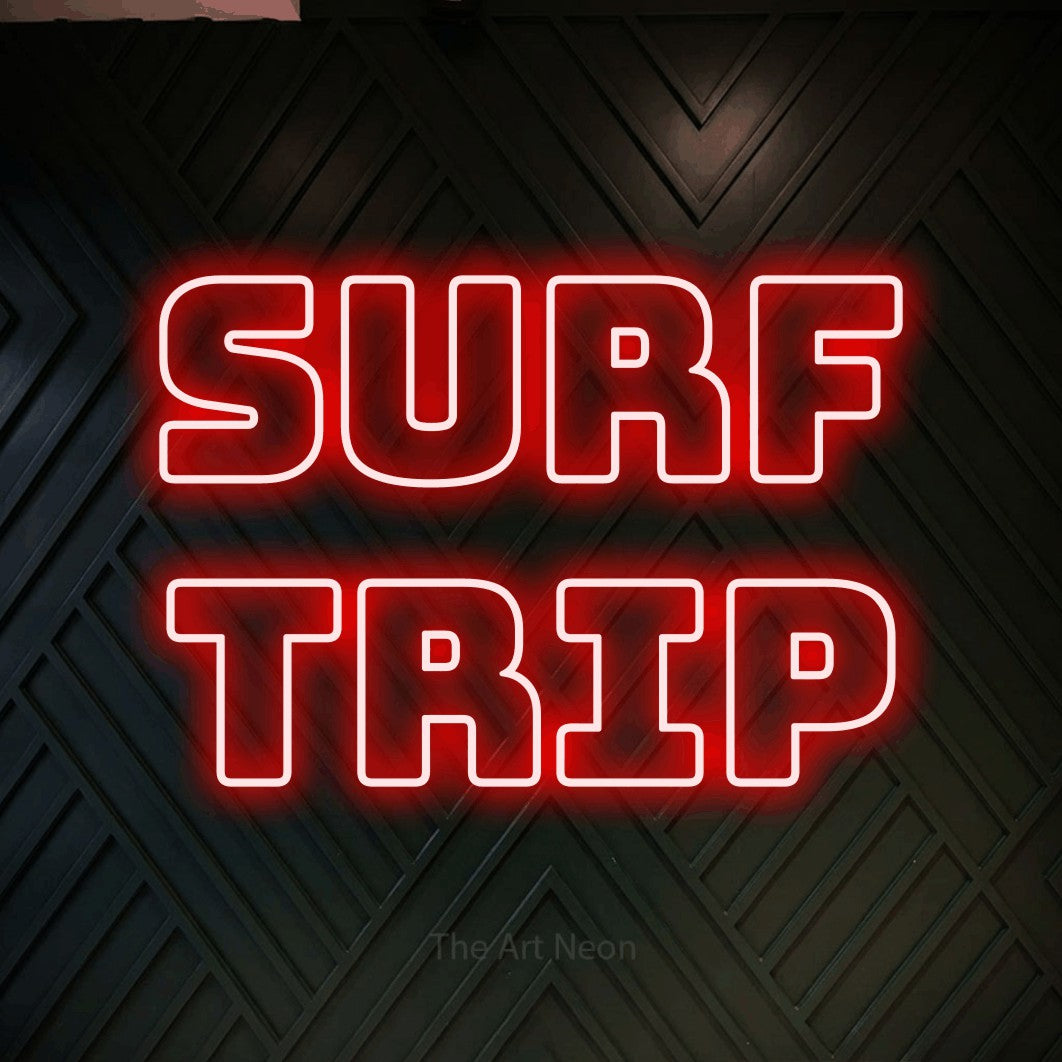 LED neon sign reading “Surf Trip”, arranged in 2 lines.