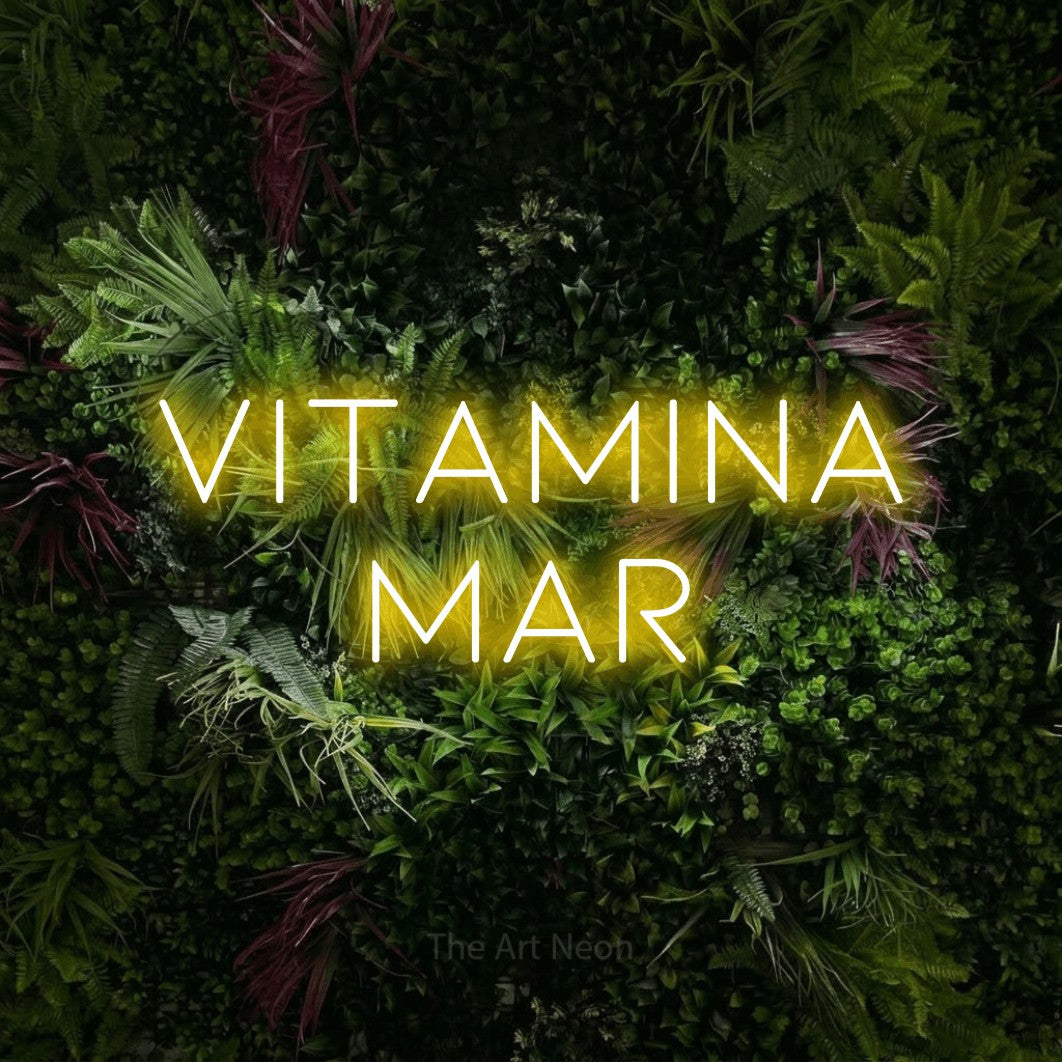 LED neon sign reading “VITAMINA MAR”, arranged in 2 lines.
