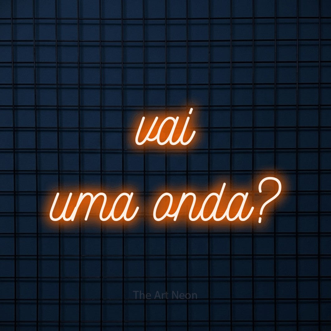 LED neon sign reading “vai uma onda?”, arranged in 2 lines.