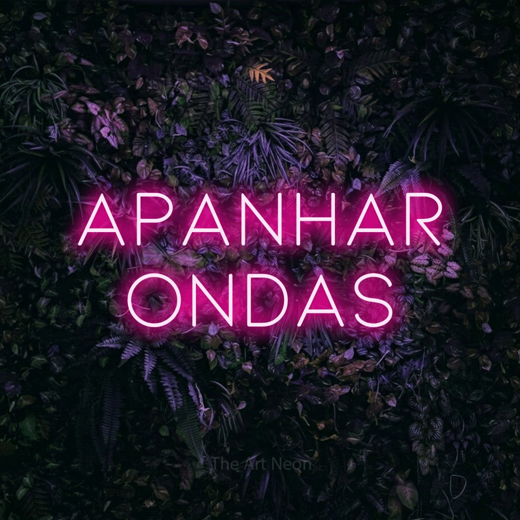 LED neon sign reading “apanhar ondas”, arranged in 2 lines.
