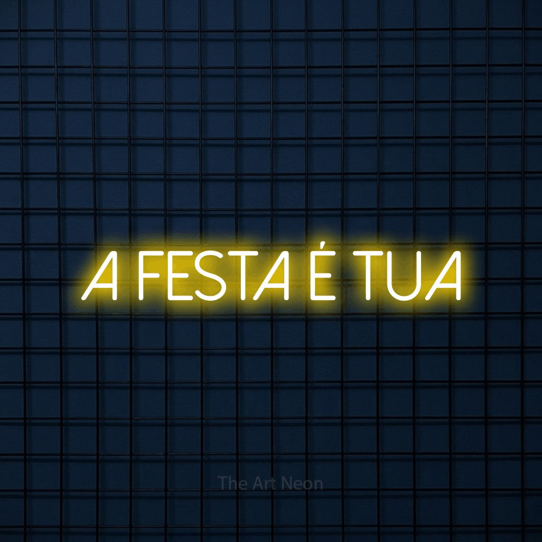 LED neon sign reading “a festa é tua”, arranged in a single line.