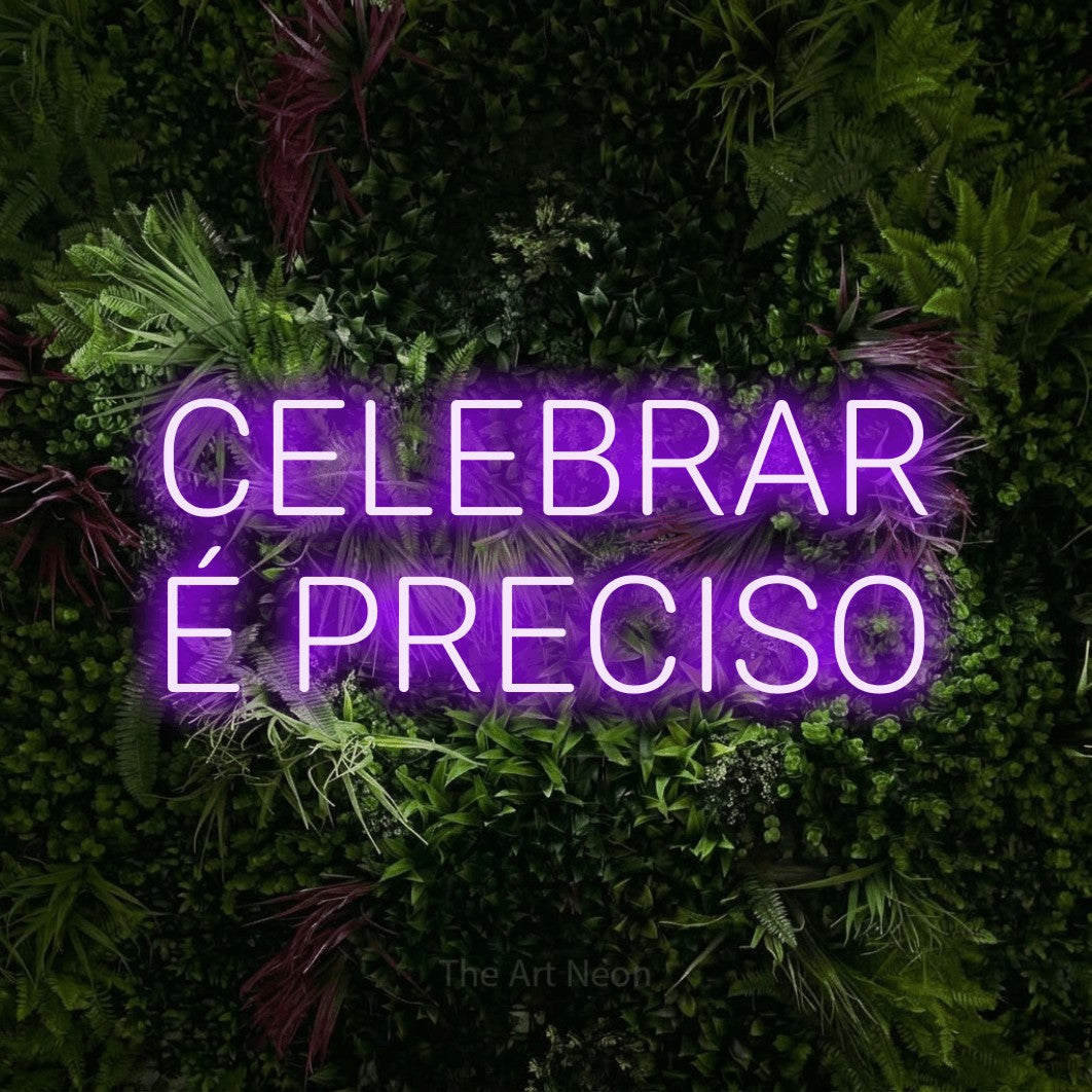 LED neon sign reading “CELEBRAR É PRECISO”, arranged in 2 lines.