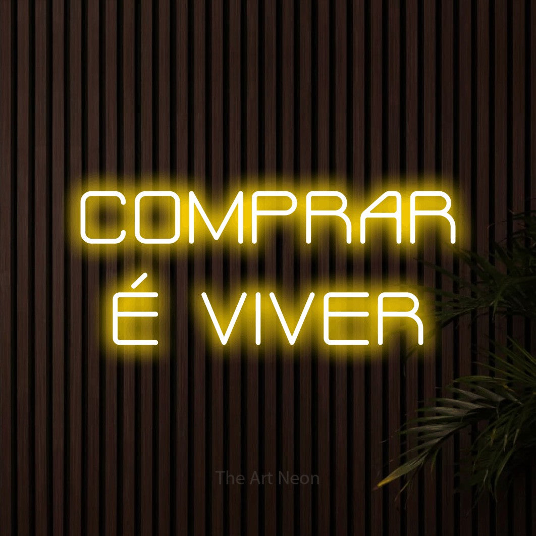 LED neon sign reading “COMPRAR É VIVER”, arranged in 2 lines.