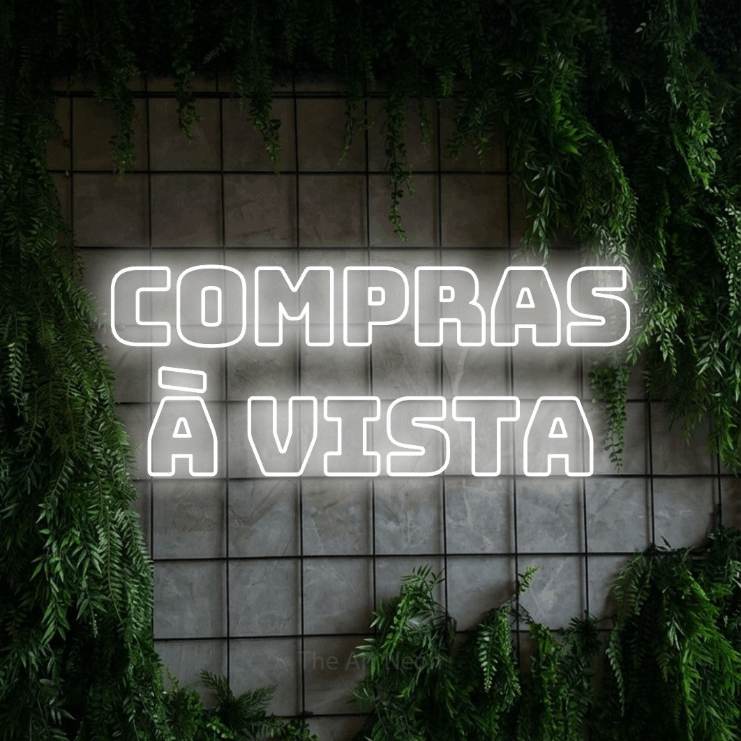 LED neon sign reading “compras à vista”, arranged in 2 lines.