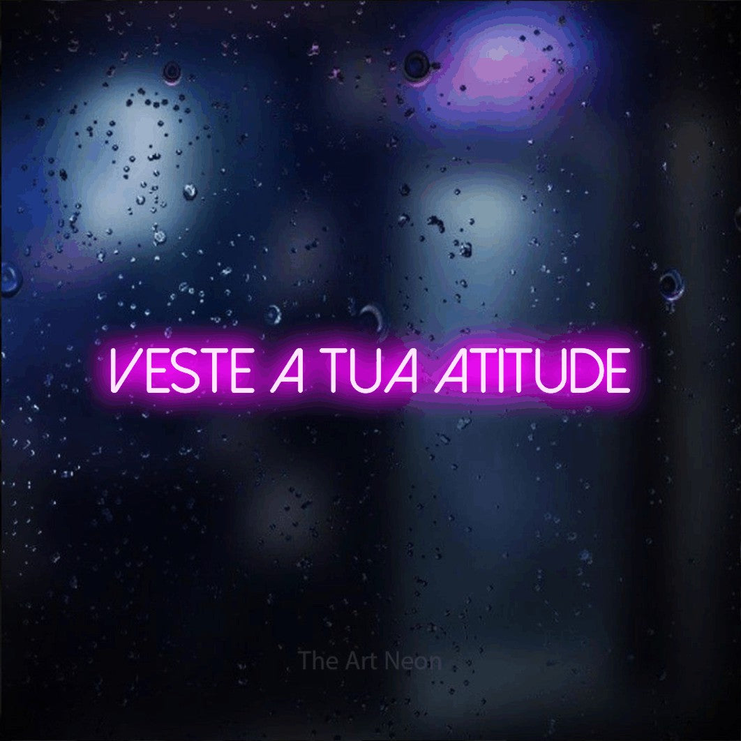 LED neon sign reading “veste a tua atitude”, arranged in a single line.