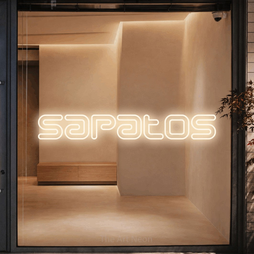 LED neon sign reading “Sapatos”, arranged in a single line.