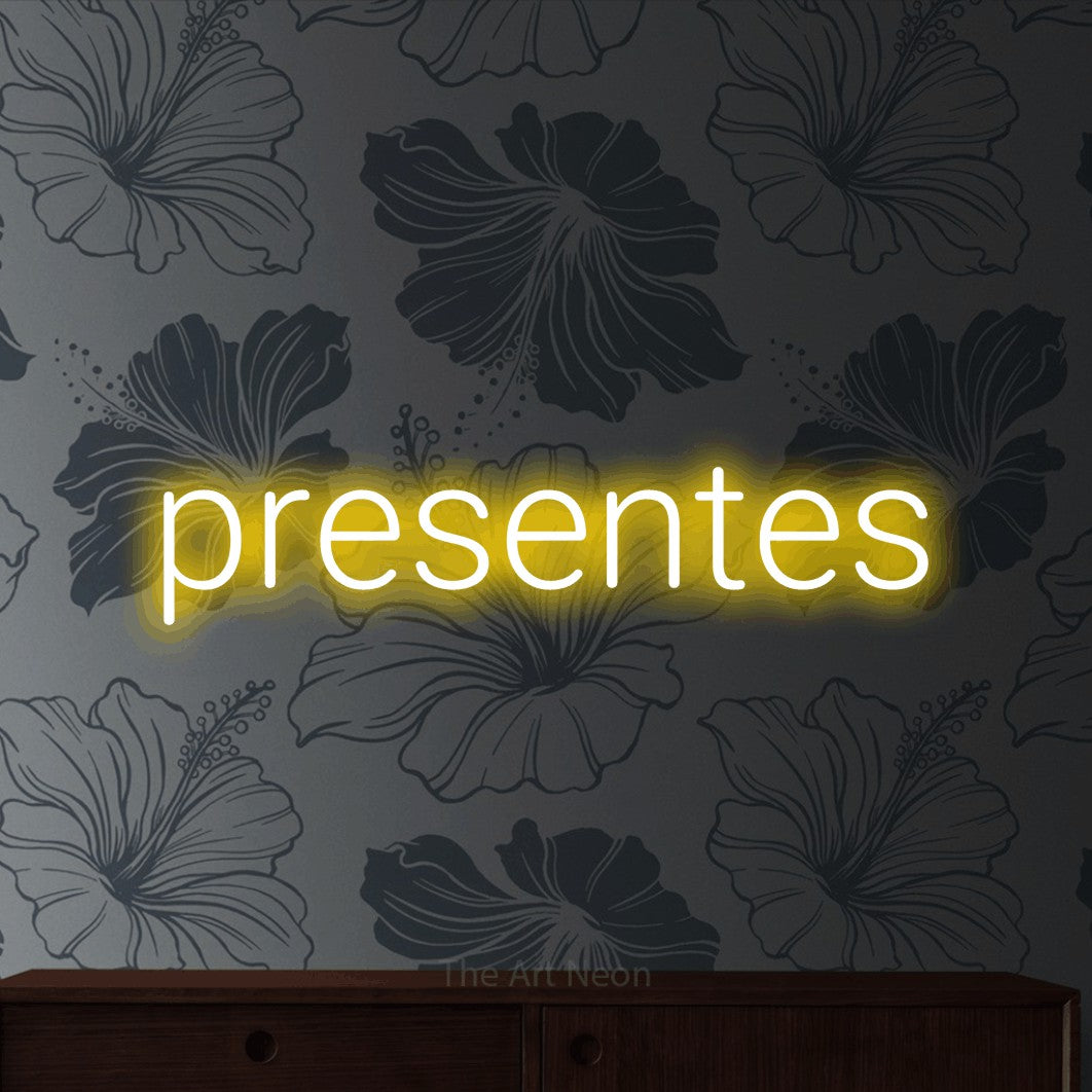 LED neon sign reading “presentes”, arranged in a single line.