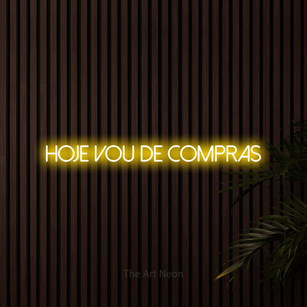 LED neon sign reading “hoje vou de compras”, arranged in a single line.