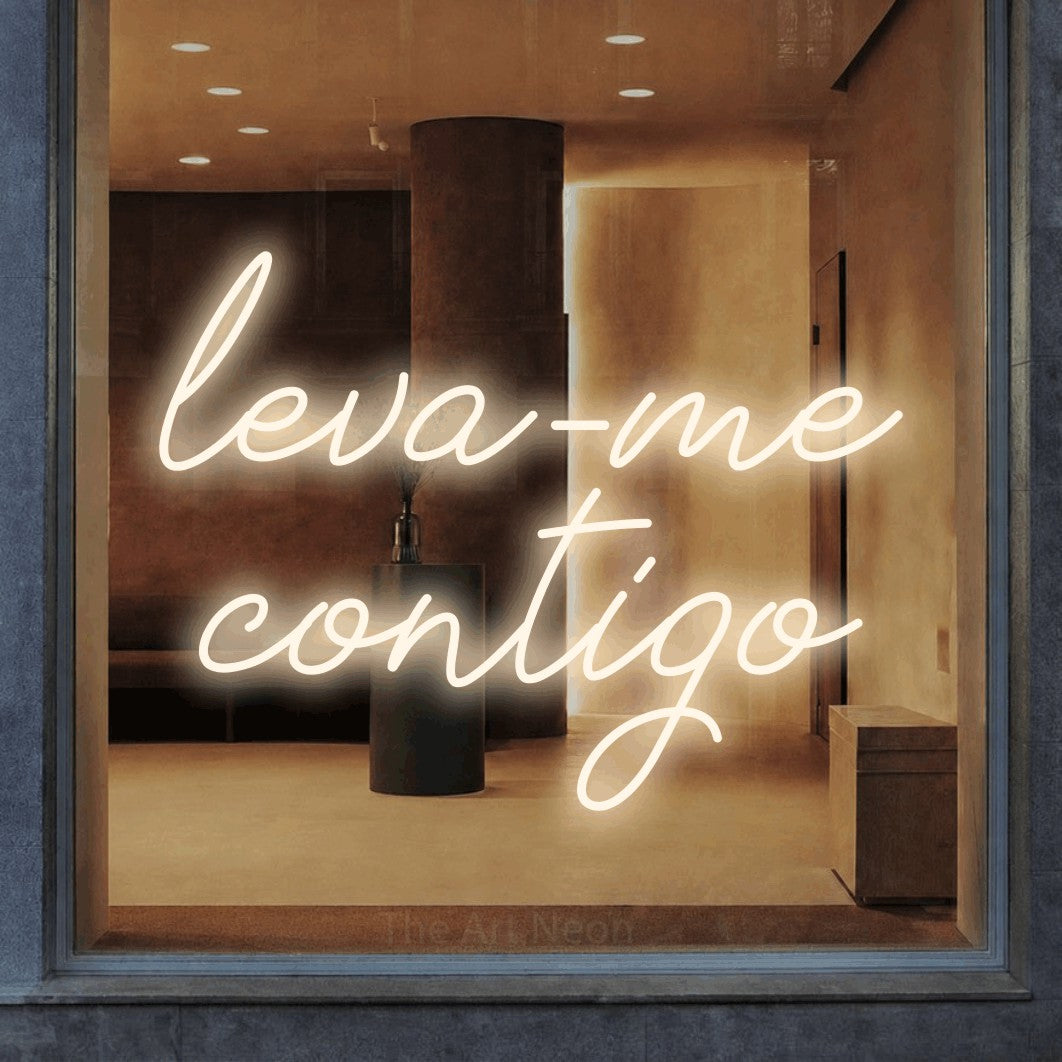 LED neon sign reading “leva-me contigo”, arranged in 2 lines.