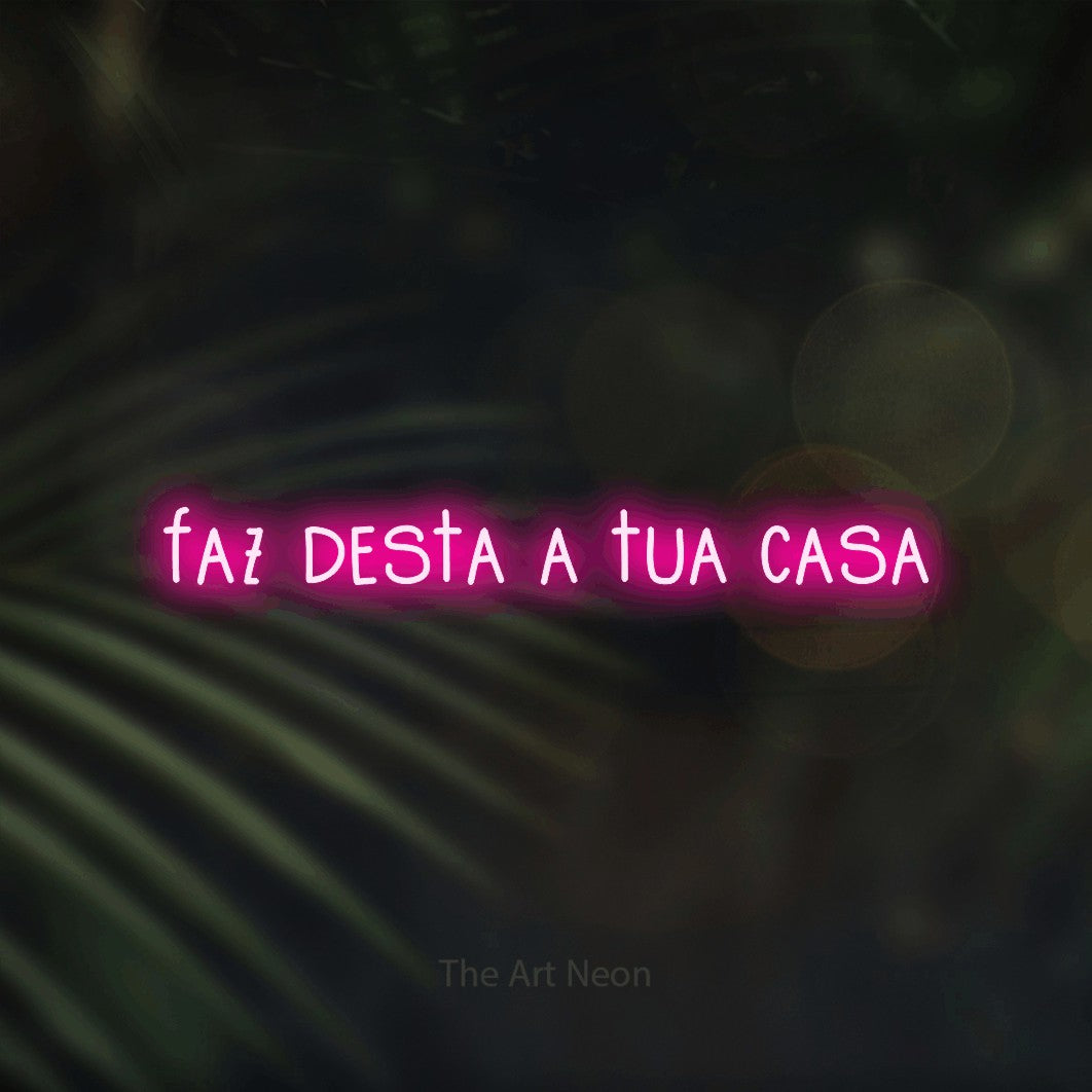 LED neon sign reading “faz desta a tua casa”, arranged in a single line.