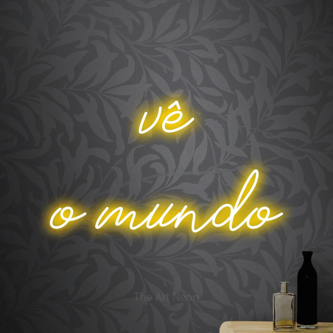 LED neon sign reading “vê o mundo”, arranged in 2 lines.