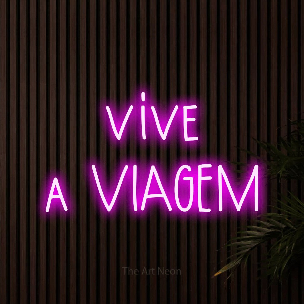 LED neon sign reading “vive a VIAGEM”, arranged in 2 lines.